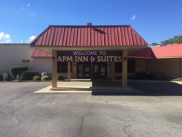 APM Inn & Suites